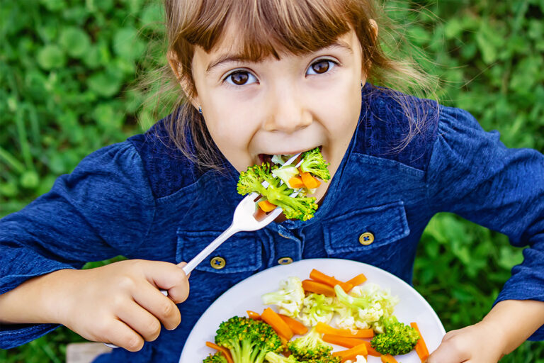 Girl eating salad